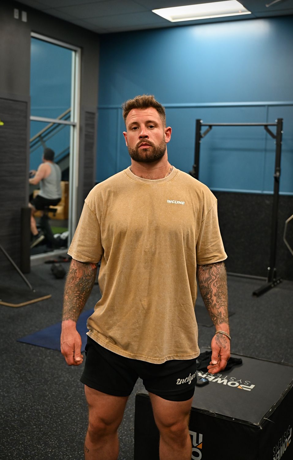 Kevin Clark — founder of iNCLYNE, wearing the Oversized Athletic Tee